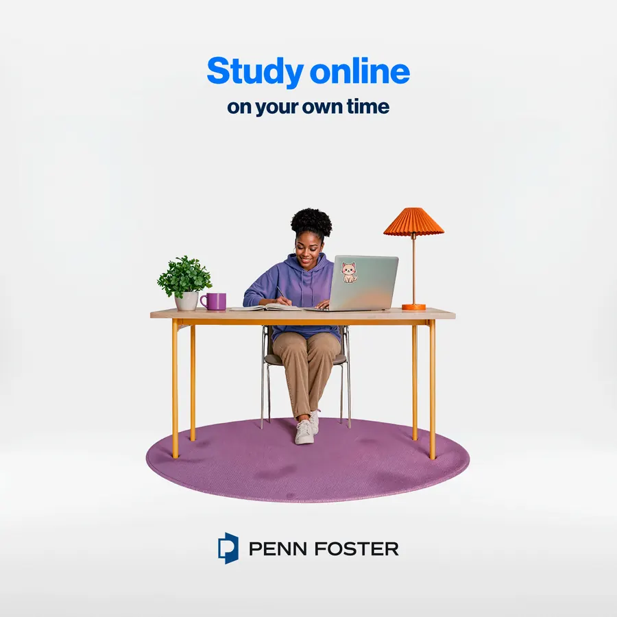 Woman at a desk with a laptop
