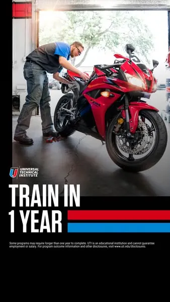 Universal Technical Institute ad: a mechanic works on a red motorcycle under the text TRAIN IN 1 YEAR